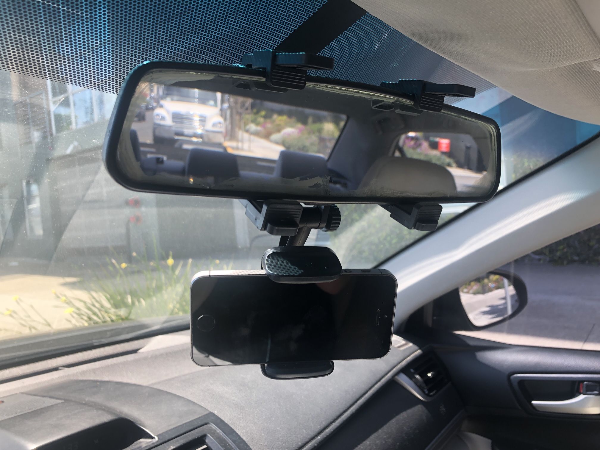 Hands-free Cellphone holder hangs on rearview mirror