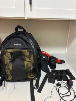 Canon DSLR Camera with Backpack and Accessories