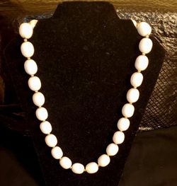 Vintage white satin glass like oval-shaped and gold accent rope 24.5-inch necklace.
