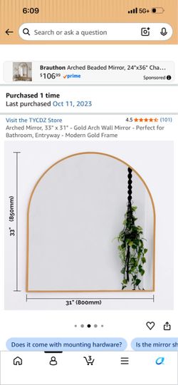 Arched gold mirror