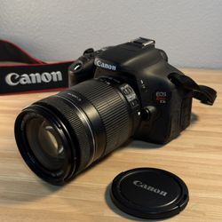 Canon EOS Rebel T3i SLR Camera with Canon Zoom lens 18-135 mm and brand new batteries