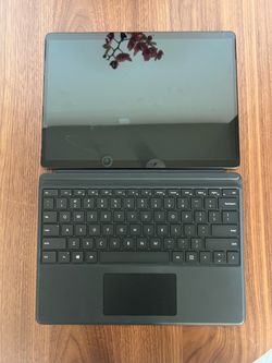 Surface Pro X - Black, 8GB, 128GB 13 inch with Keyboard and charger.  Hardly used