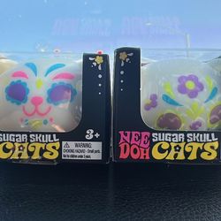 Needoh glow in the dark sugar skull cats