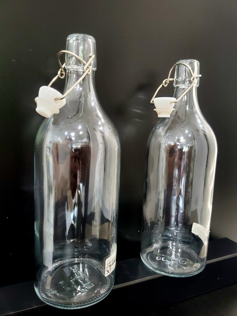 IKEA #15234 Swing Top Covered Bottles Clear 11" Tall. Purchased and Never Used / 2 For $6 / Miami 33182.
