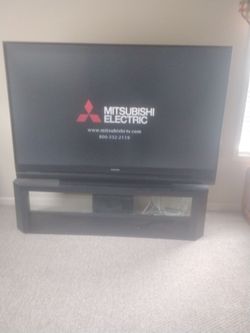 65 inch Mitsubishi TV with  stand