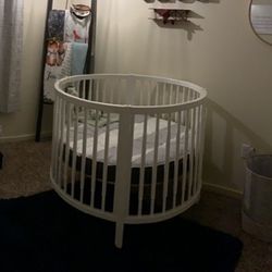 White circle cheap crib