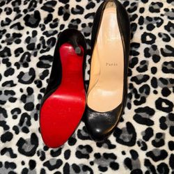 Christian Louboutin black pumps