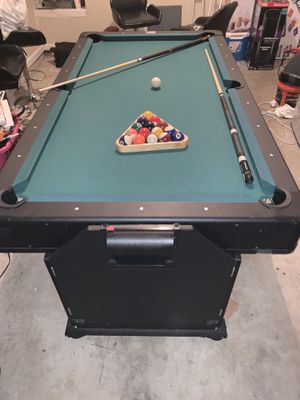 Photo Fat Cat 2-in-1 Pockey pool and air hockey table!