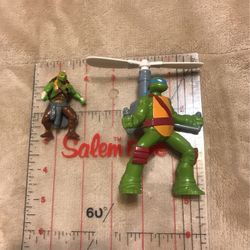 Two Teenage Mutant Ninja Turtles 