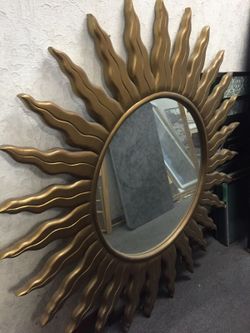 Golden sun mirror.