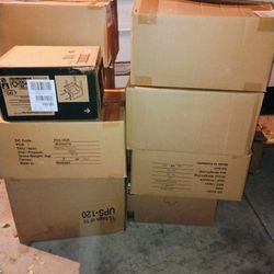 10 Boxes Of Clothes And Toys
