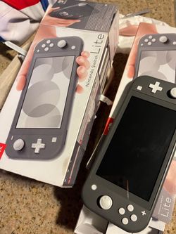 2 Nintendos switch lite color gris