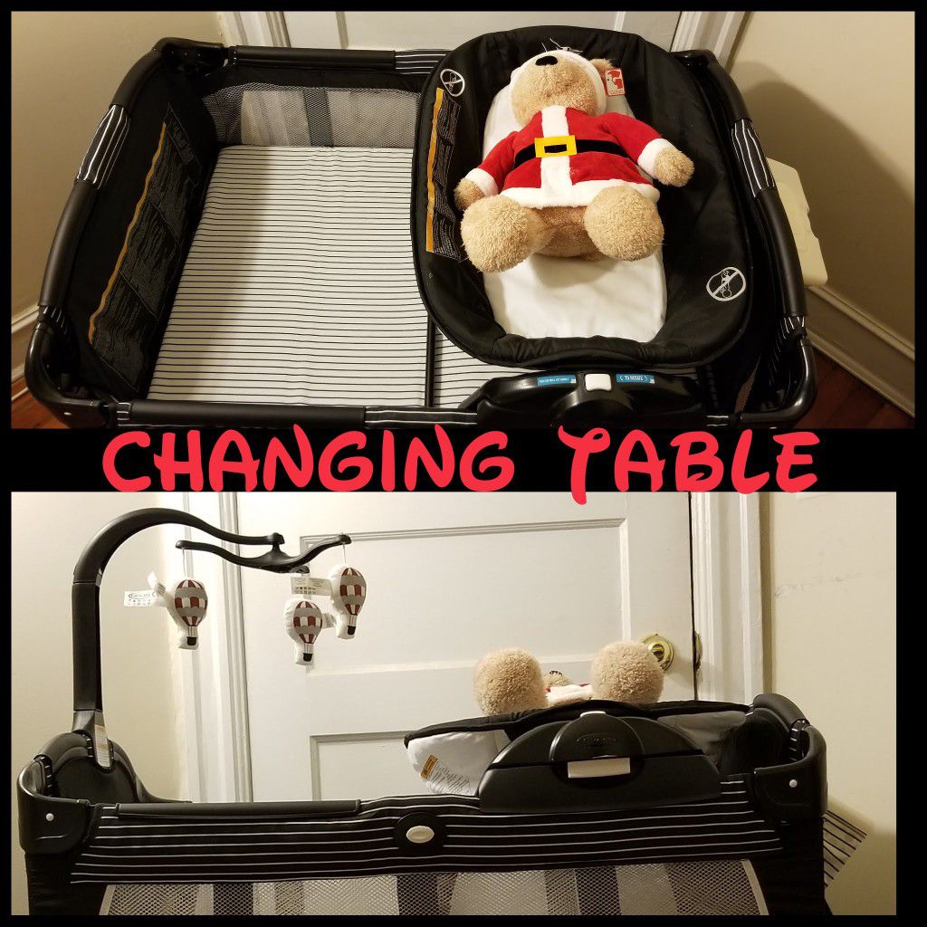 Playpen with changing table