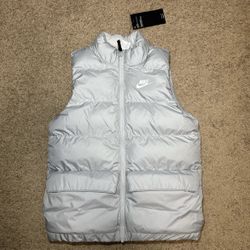 Nike light grey puffer vest with pockets