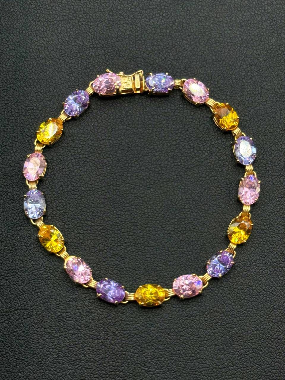 10k solid yellow gold multi color stone 7” lady’s bracelet