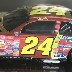 Jeff Gordon 1:24 scale #24 Dupont Chromalusion 1998 Monte Carlo Limited Edition car and bank.