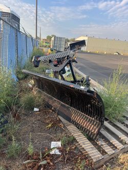Two separate snow plows for sale