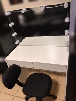 Vanity with mirror and chair