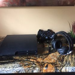 PS3 with 2 controllers and Bluetooth Sony headphones