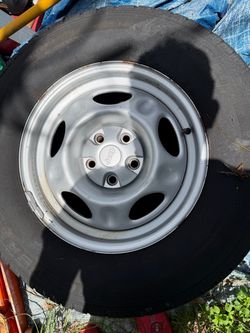Jeep rims and Older pair tires. 245 70r16
