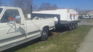 Photo Truck and trailer 1991 f 250 sweet truck and 18ft gooseneck homemade built 16ft dovetail 2 ft adjustable dovetail ramps side pockets 3 axle