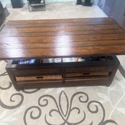 Beautiful solid wood coffee table with built-in storage. 