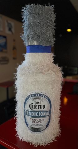 Piñata in the shape of Jose Cuervo Bottle