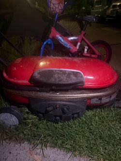 Coleman BBQ grill with wheels