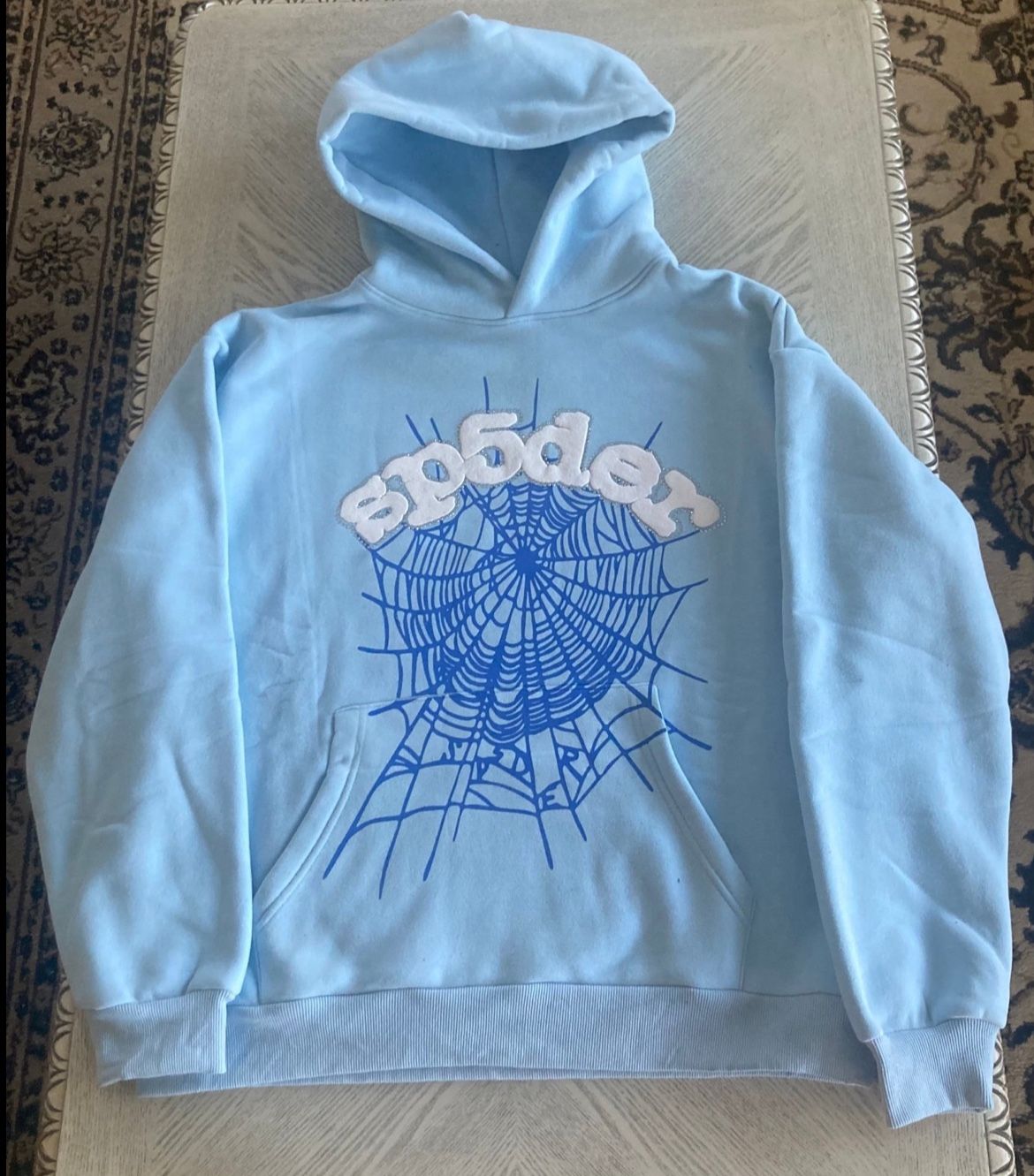 light blue sp5der hoodie. Size L