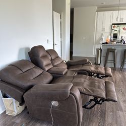 Reclining leather couch with phone chargers