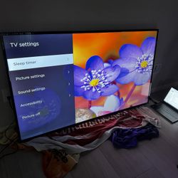 4K TCL 65” Smart TV - Roku TV