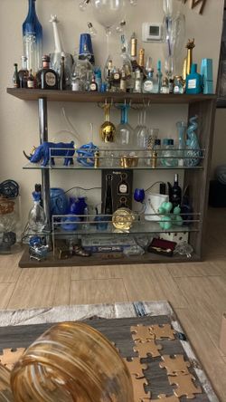 Bar gray wood has matching tv stand and coffee table