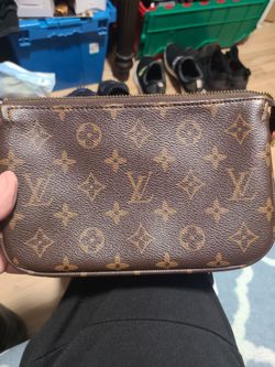 Louis Vuitton small hand bag new never used