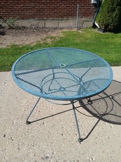 42 inch round rought  iron table used