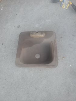 Brass sink