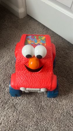 Elmo giggle & go truck