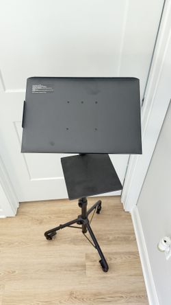 Rolling adjustable podium / laptop stand.