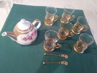 Vintage French tea Pot and cups with golden Metal holders. Woodland Hills Ca. 