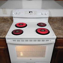 GE, WHITE  ELECTRIC  STOVE.