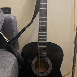 Acoustic black guitar