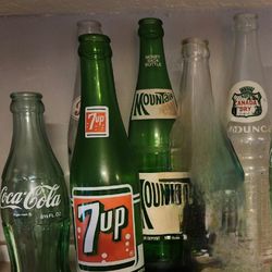 9 Vintage  BOTTLES Coke/pepsi..etc 