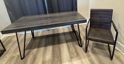 Ashley’s Furniture Luxury Dining Table and 4 Rocking chairs