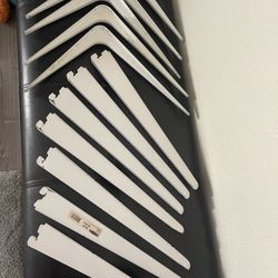 Shelf Brackets.  5 - 12” and 7 - 14.5” Used I. Excellent Condition