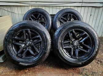 18” OEM Chevy Rims with tires