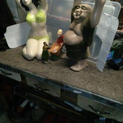 Ceramic statues bikini lady and Buddha figures
