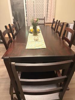 Dining table with eight chairs 🪑 including 2 armchairs