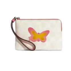 COACH BUTTERFLY CORNER ZIP WRISTLET IN SIGNATURE CANVAS & SMOOTH LEATHER