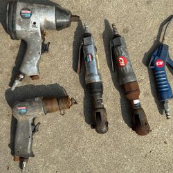 automotive air tools. Includes Craftsman air impact wrenches (2), air ratchets (2), and air blow gun.
