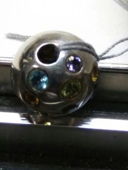 Sterling silver charm.