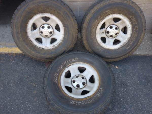 Three Jeep steel rims and 31 inch tires 5 lug Dodge, Ford, Toyota